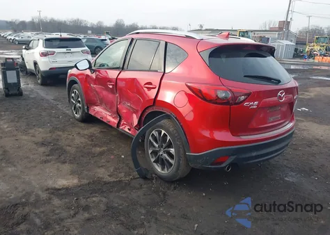 2016 Mazda Cx-5 Grand Touring z USA, uszkodzony, nr VIN JM3KE4DY4G0704656